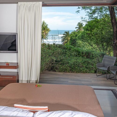 #8 King Deluxe Room – Partial Ocean View