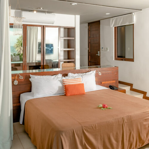 #8 King Deluxe Room – Partial Ocean View